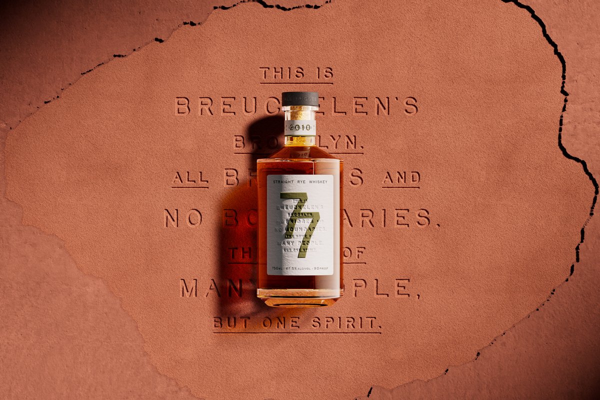 Breuckelen Distilling 77 Whiskey bottle against a terracotta-coloured background