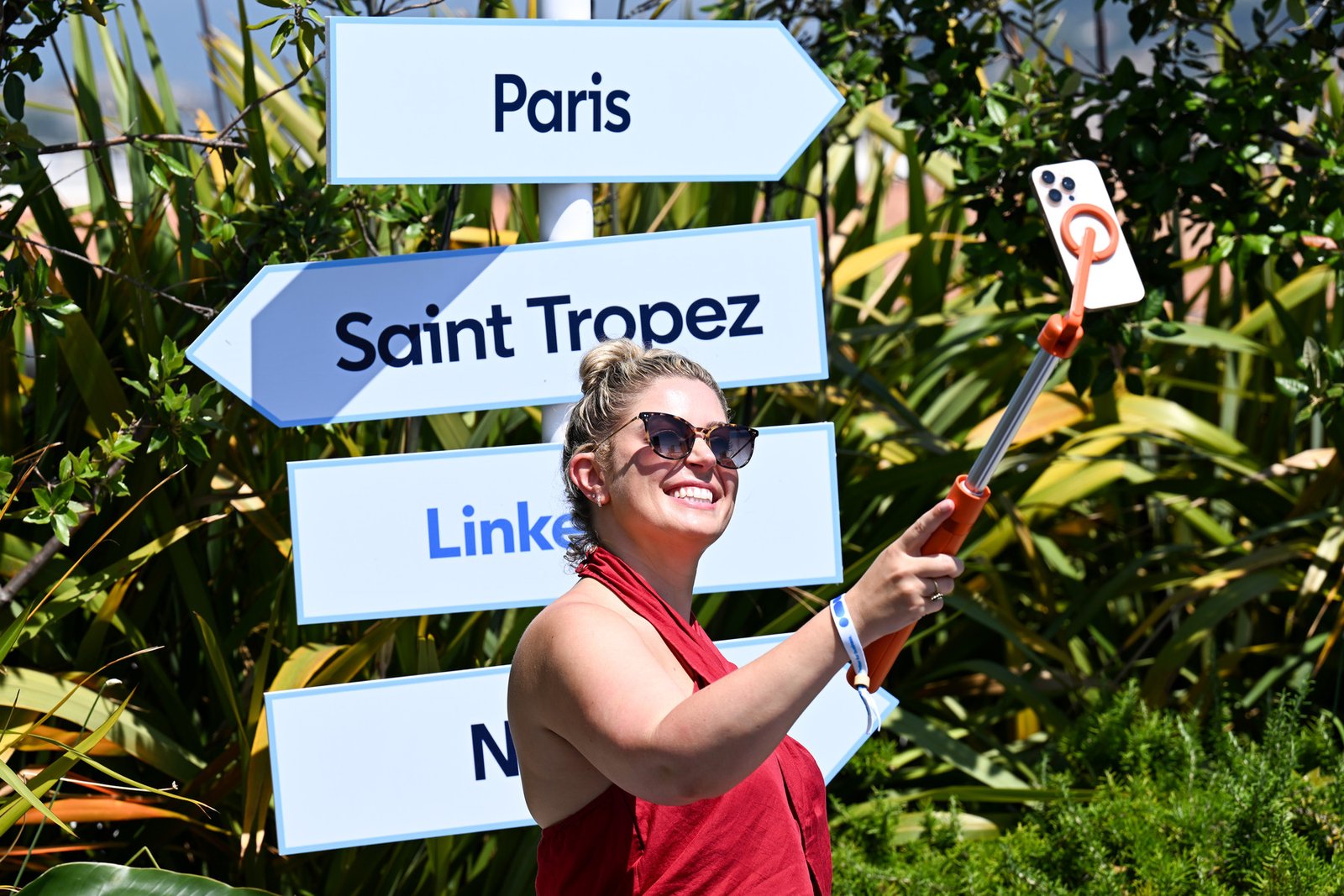 A visitor taking a photograph at the LinkedIn activation in Cannes
