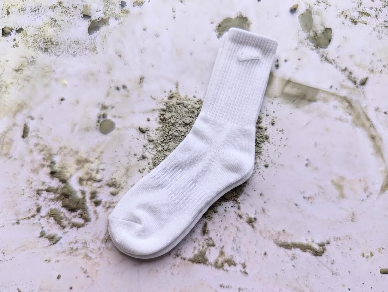White sock used as the mold for the large cement mushroom stem
