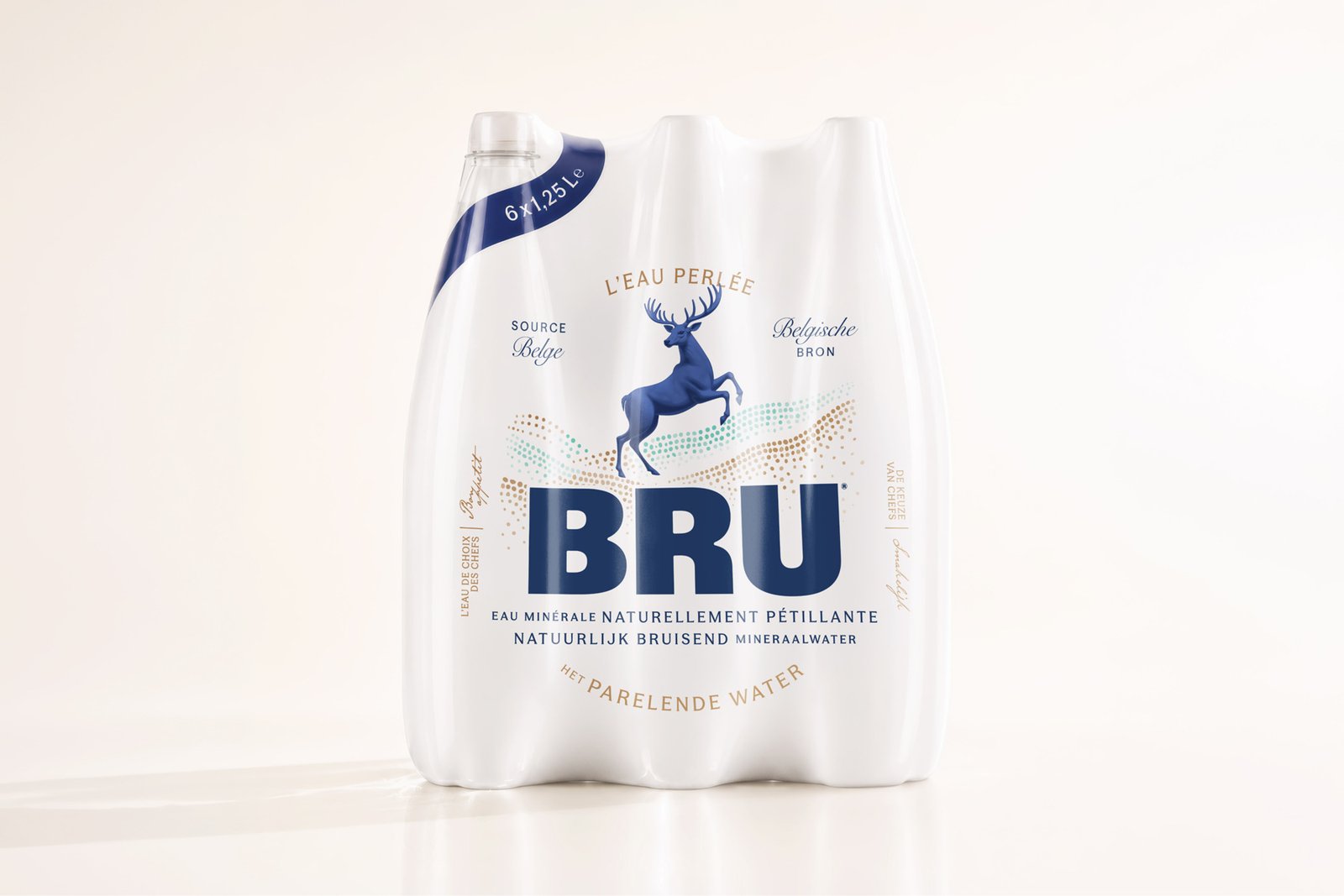 Person holding a BRU sparkling water brand card displaying the logo and tagline "Naturally sparkling, some things just belong on the table"