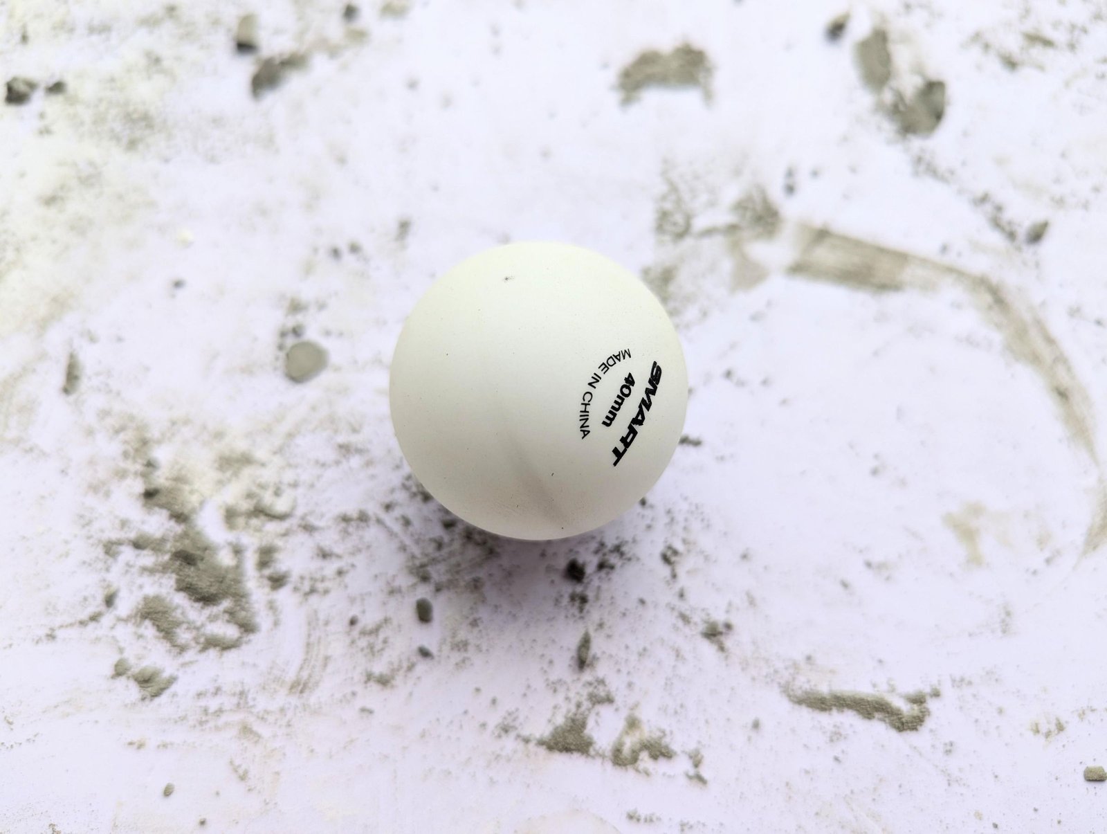 White ping-pong ball used to mold the smaller mushroom caps