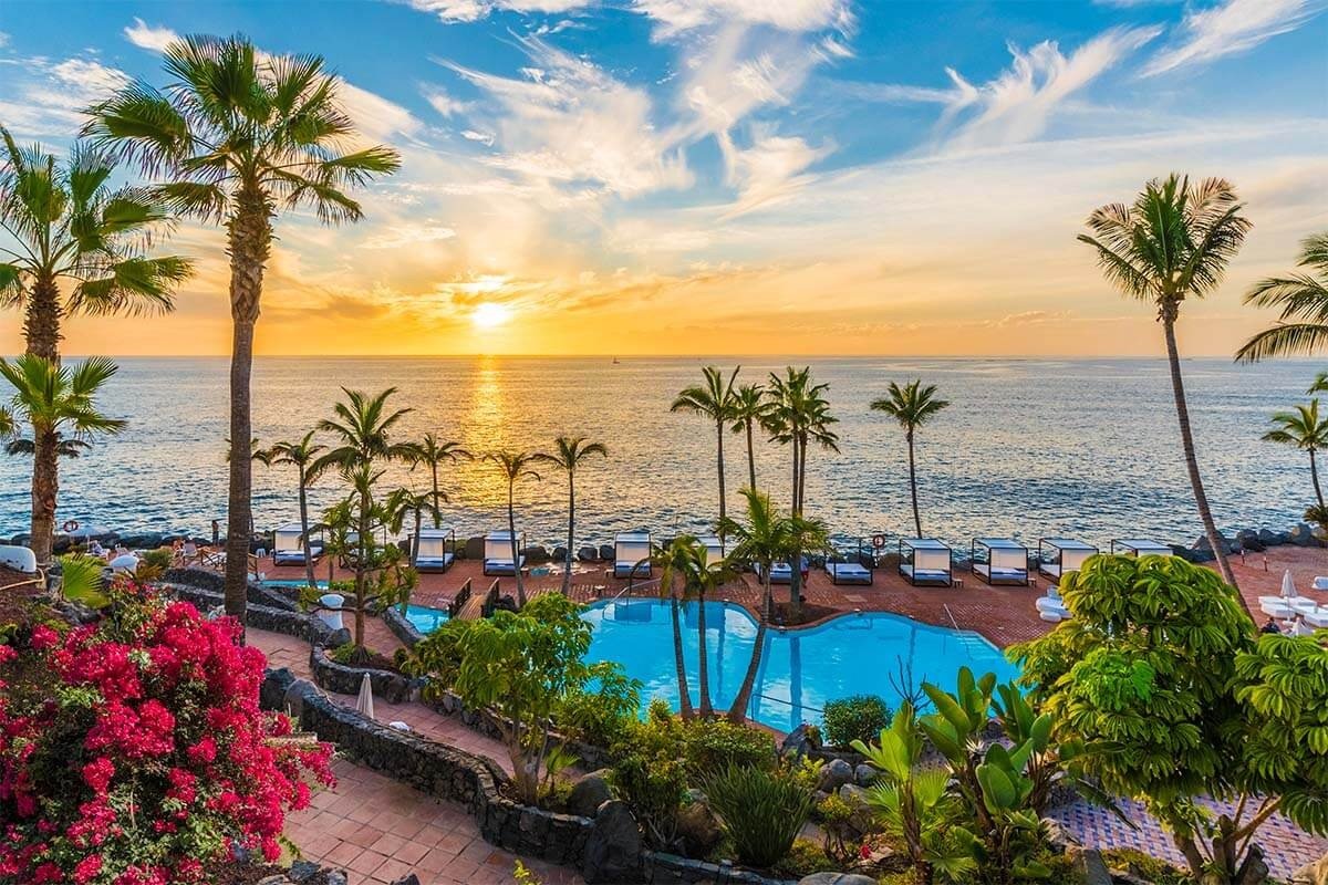 Sunset over a resort and the ocean in central Costa Adeje