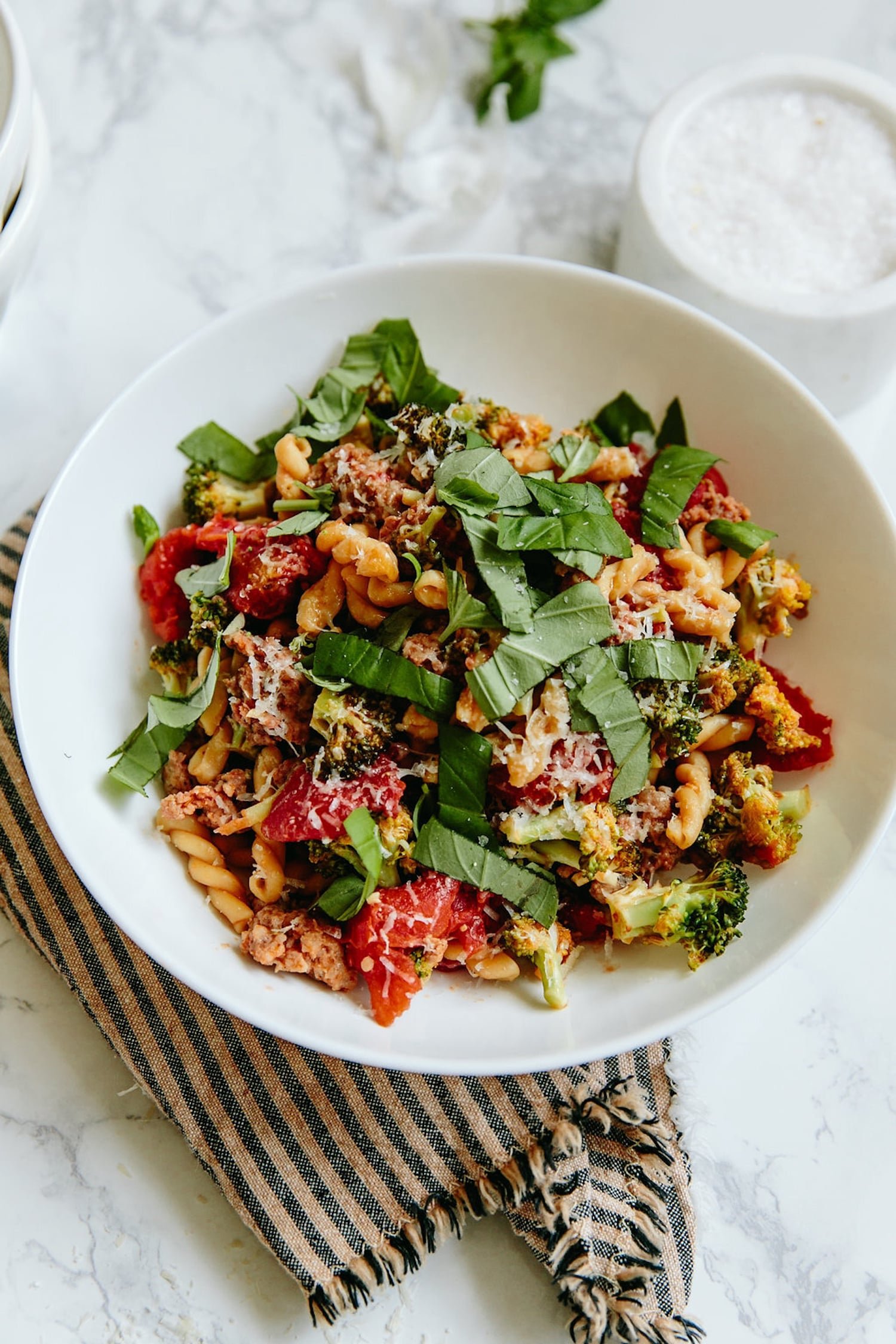 Gemelli pasta with turkey sausage, broccoli, tomatoes, basil, and Parmesan