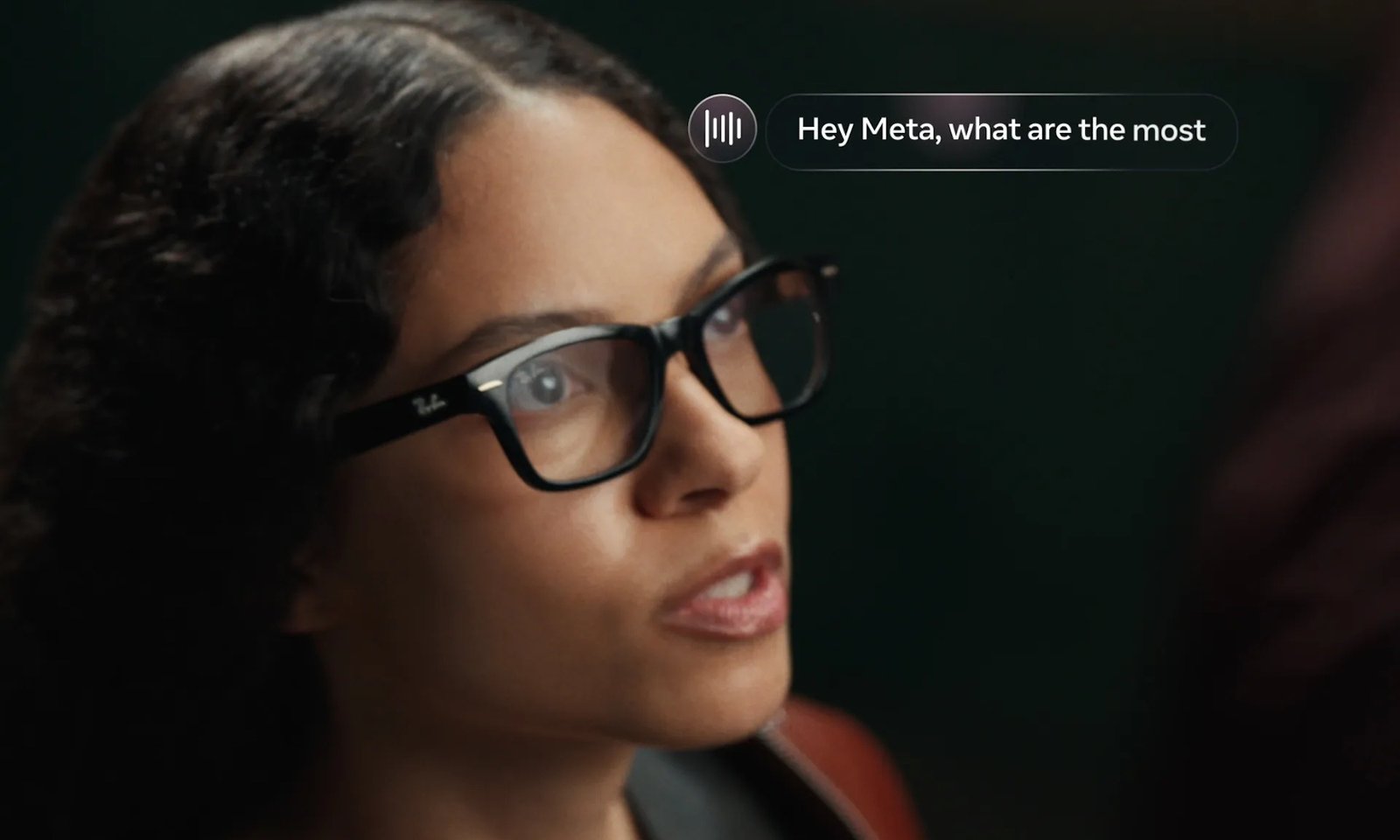Woman wearing Ray-Ban Meta Audio glasses during a conversation
