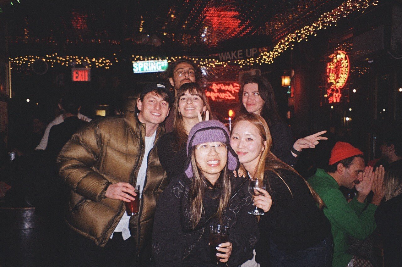 Koto colleagues gathered together at a night-time venue in New York