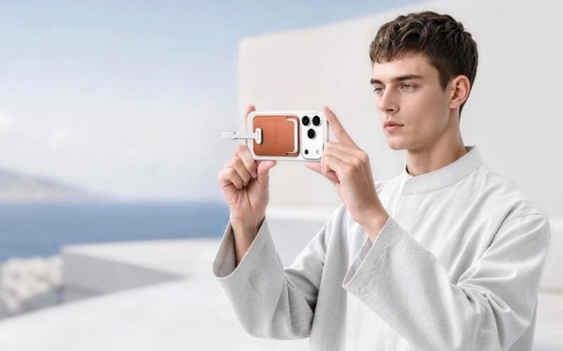 Creator recording video with Lexar Muse attached to an iPhone