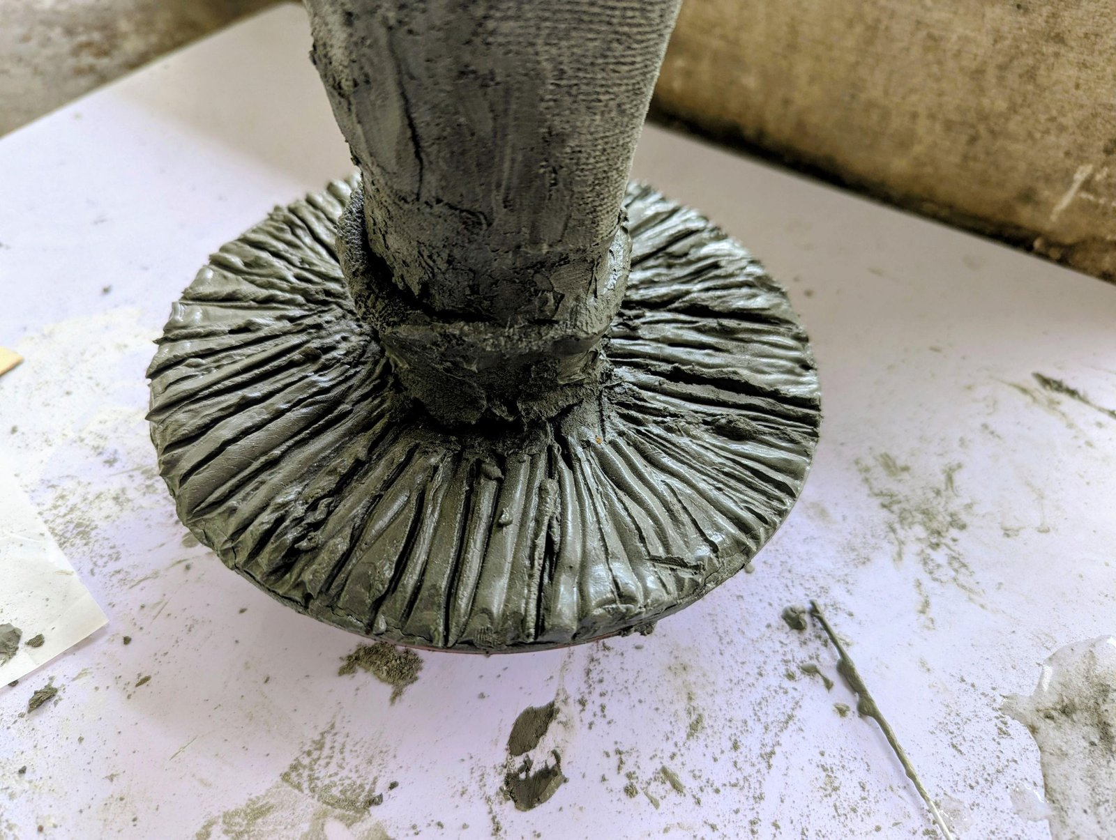 Completed cement gills and raised ring beneath the large mushroom cap