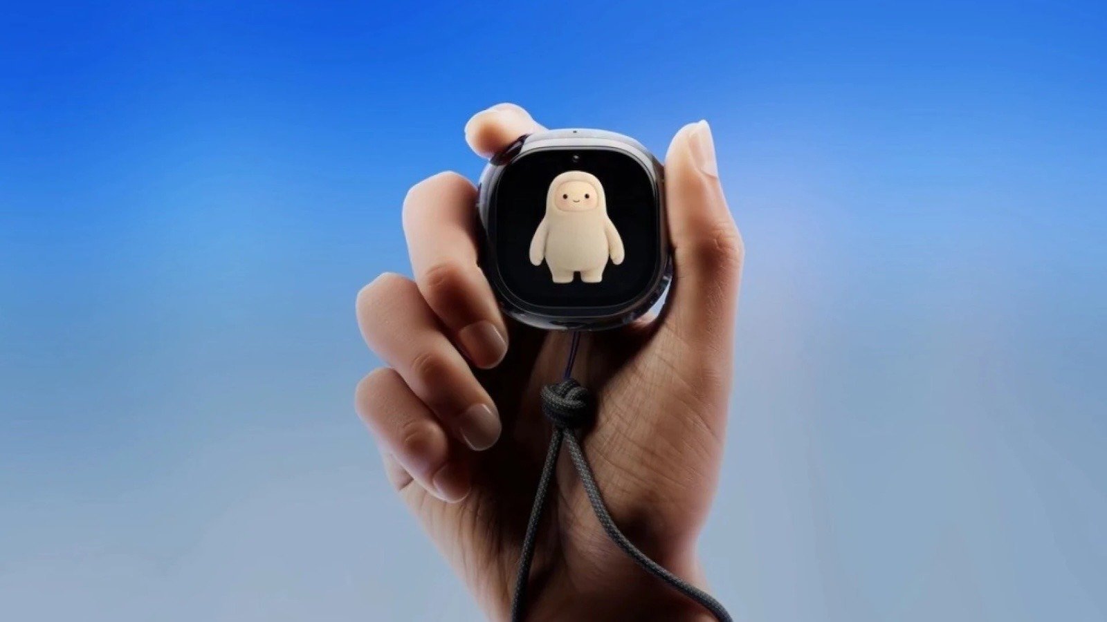 Meta Muse Charm pocket device held against a blue background