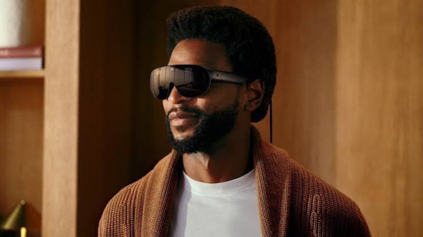 Man wearing Meta VR Glasses in a living room