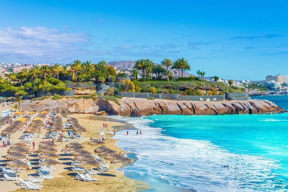 Pale sand and turquoise water at Playa del Duque