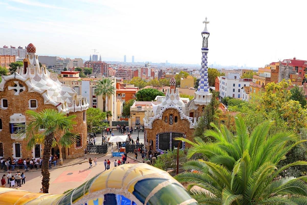 Colorful Park Güell architecture with the Barcelona skyline beyond