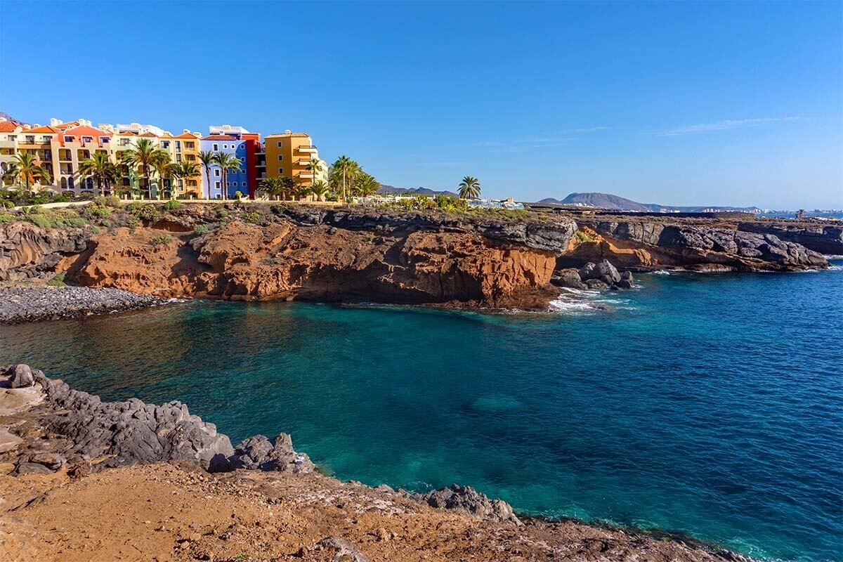 Rocky coastline and blue water in the Playa Paraíso area