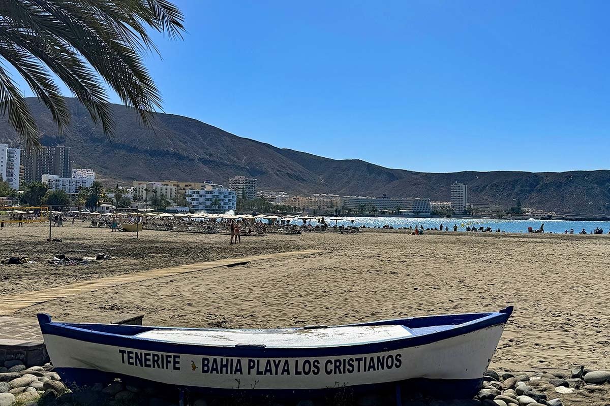 Sandy beach and harbor in Los Cristianos