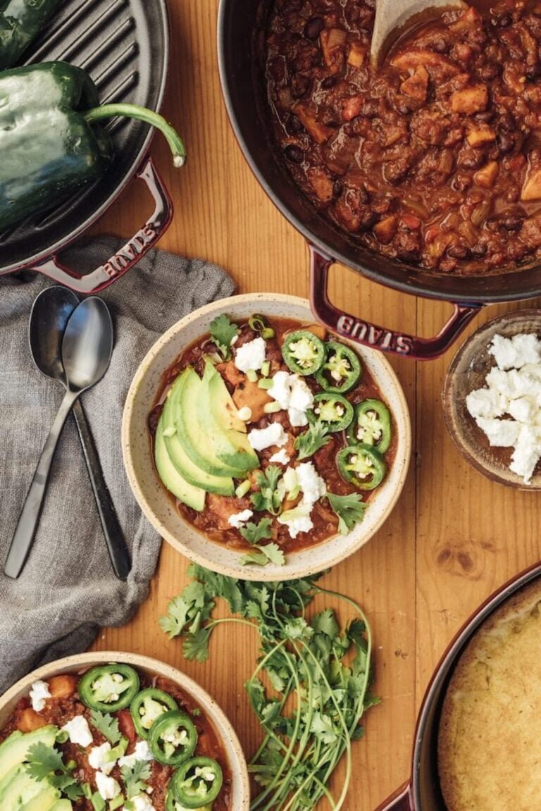 Sweet potato and black bean chili with avocado and herbs